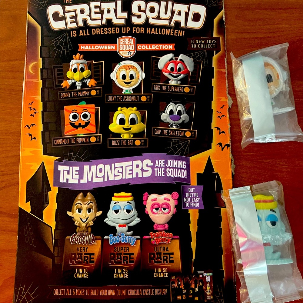 Cereal Squad Boo Berry and Lucky the Astronaut. Comes with back of a cereal box.